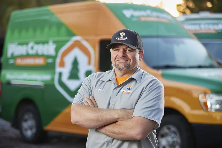 Pine Creek Plumbing owner with truck in background