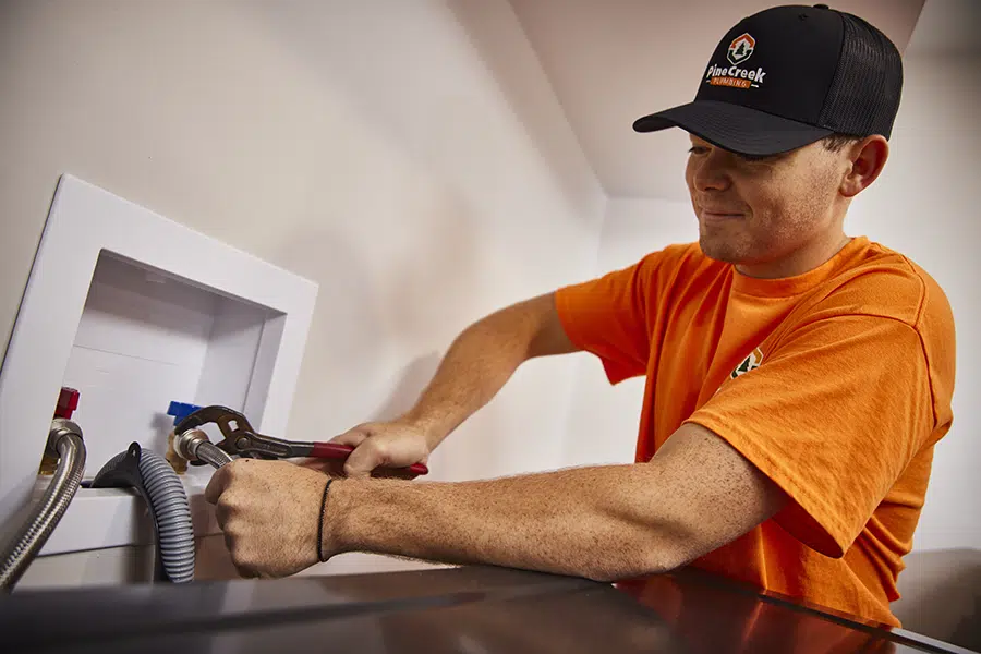 Pine Creek Plumber working inside Wexford, PA home