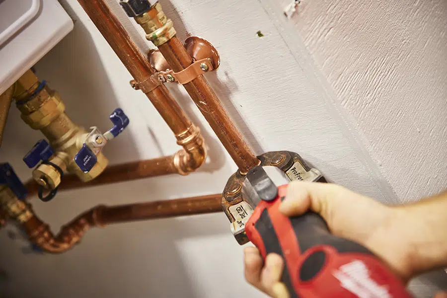 closeup of pipe repair by Pine Creek Plumbing plumber