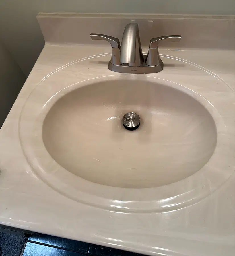 Sink replacement by Pine Creek Plumbing. modern brushed nickel faucet and a new, durable drain assembly. 